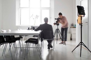 Example of Video Outcomes videographer giving corporate interview in front of camera