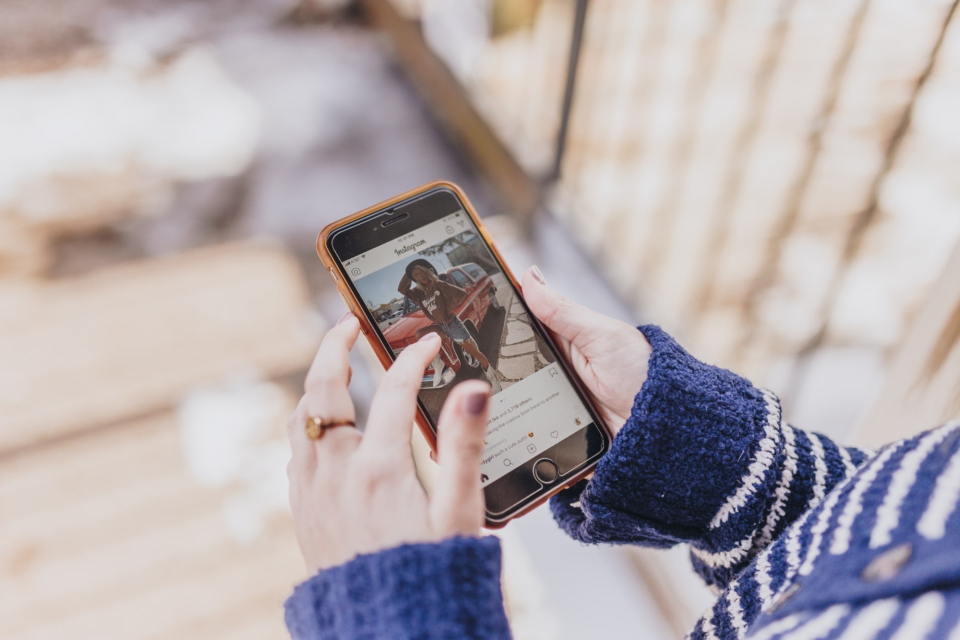 person browsing instagram using phone