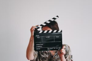 holding a clap clapboard for production